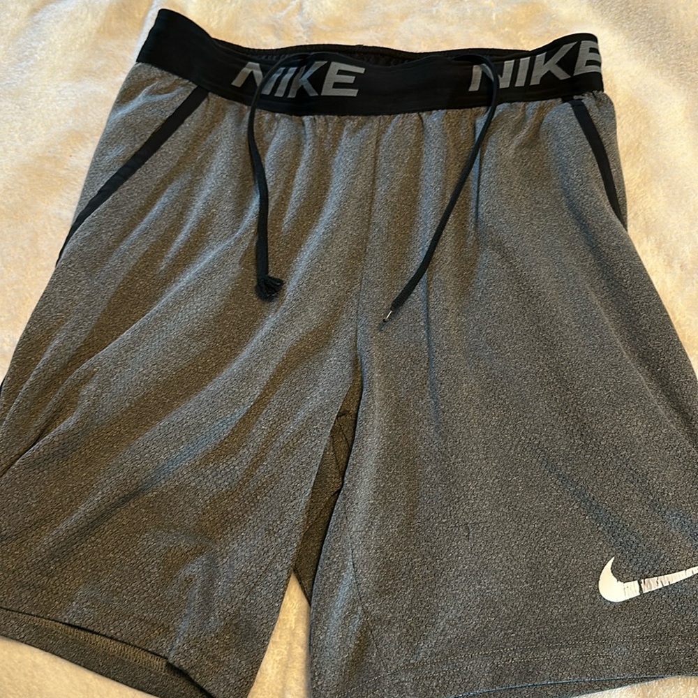 Nike Men’s Small with pockets, good condition